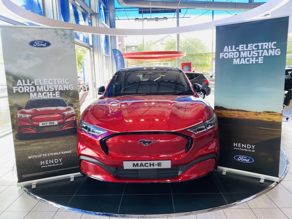 Ford showroom marketing campaign with roller banners